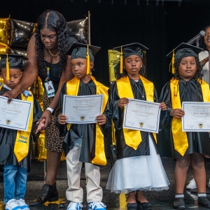 Rosen-Tangelo-Park-Graduation-Kids-Receiving-Diplomas