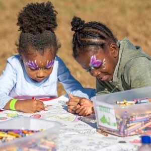 Two-Girls-Coloring-Outside