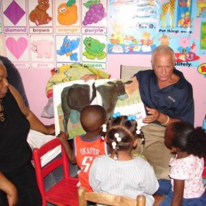 (2011) Harris Rosen visiting one of ten Tangelo Park home childcare facilities.