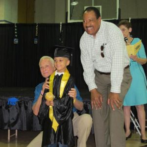 Tangelo Park 2-yr-old Graduation Pics: Mr. Harris Rosen with Student